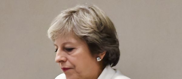 British Prime Minister Theresa May waits for the arrival of European Council President Donald Tusk prior to a bilateral meeting with European Council President Donald Tusk during an EU summit in Brussels on Friday, Oct. 20, 2017 - Sputnik International