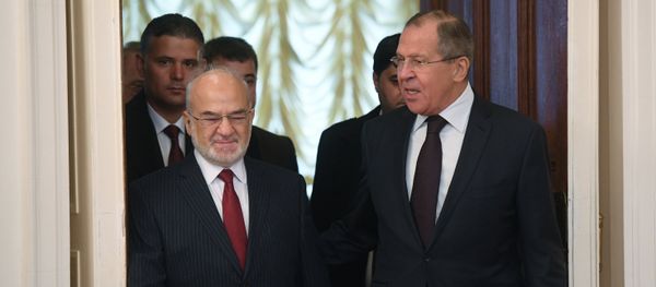Foreground, from right: Russian Foreign Minister Sergei Lavrov and his Iraqi counterpart Ibrahim al-Jaafari during a meeting in Moscow Foreground, from right: Russian Foreign Minister Sergei Lavrov and his Iraqi counterpart Ibrahim al-Jaafari during a meeting in Moscow - Sputnik International
