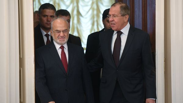 Foreground, from right: Russian Foreign Minister Sergei Lavrov and his Iraqi counterpart Ibrahim al-Jaafari during a meeting in Moscow Foreground, from right: Russian Foreign Minister Sergei Lavrov and his Iraqi counterpart Ibrahim al-Jaafari during a meeting in Moscow - Sputnik International