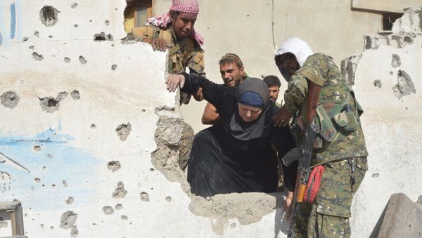 Residents of the liberated Raqqa province. File photo Residents of the liberated Raqqa province. File photo - Sputnik International