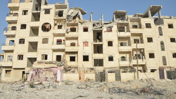 Damaged building of the liberated Al-Raqqah Province - Sputnik International