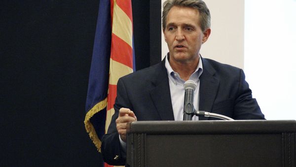 US Sen. Jeff Flake addresses business officials gathered for an event in Prescott, Arizona, Thursday, Aug. 10, 2017. - Sputnik International