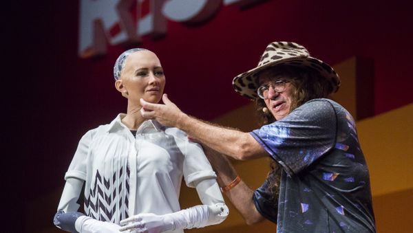 Chief scientist of Hanson Robotics, Ben Goertzel (R), describes to the audience what Sophia the Robot (L) is made of during a discussion about the future of humanity in a demonstration of artificial intelligence (AI) by Hanson Robotics at the RISE Technology Conference in Hong Kong on July 12, 2017 Chief scientist of Hanson Robotics, Ben Goertzel (R), describes to the audience what Sophia the Robot (L) is made of during a discussion about the future of humanity in a demonstration of artificial intelligence (AI) by Hanson Robotics at the RISE Technology Conference in Hong Kong on July 12, 2017 - Sputnik International