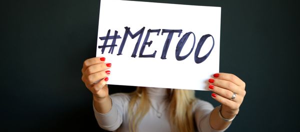 A sign held by a woman spelling #MeToo - Sputnik International