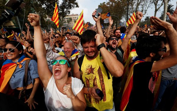 People celebrate after the Catalan regional parliament declares the independence from Spain in Barcelona, Spain People celebrate after the Catalan regional parliament declares the independence from Spain in Barcelona, Spain - Sputnik International