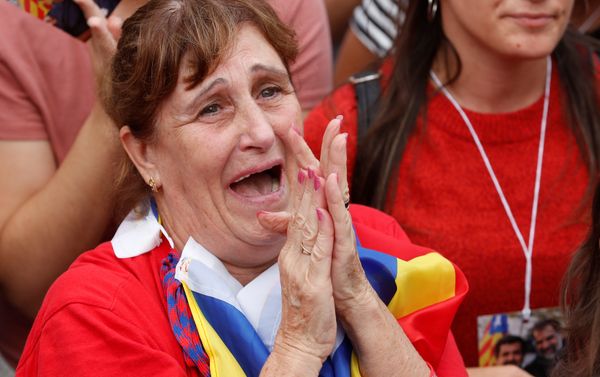 A woman reacts while the Catalan regional parliament votes for independence of Catalonia from Spain in Barcelona A woman reacts while the Catalan regional parliament votes for independence of Catalonia from Spain in Barcelona - Sputnik International
