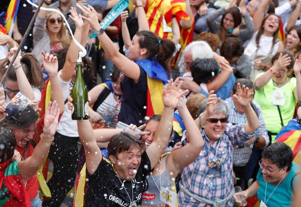 People celebrate after the Catalan regional parliament passes the vote of independence from Spain in Barcelona, Spain - Sputnik International