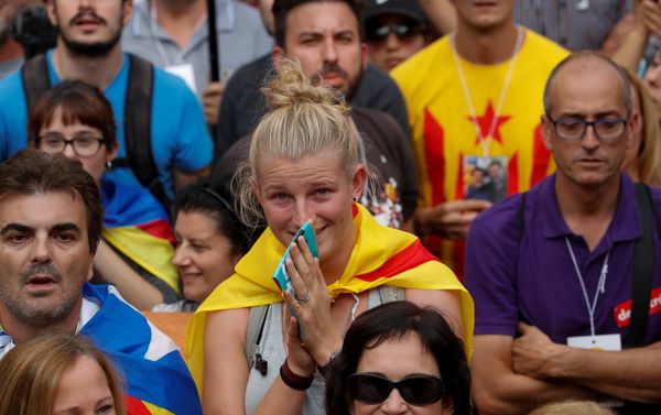 People react as they watch on giant screens a plenary session outside the Catalan regional parliament in Barcelona, Spain People react as they watch on giant screens a plenary session outside the Catalan regional parliament in Barcelona, Spain - Sputnik International