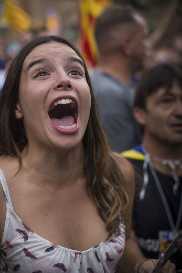 Independence supporter crying out in excitement over the Catalan Parliament's declaration of independence. Independence supporter crying out in excitement over the Catalan Parliament's declaration of independence. - Sputnik International