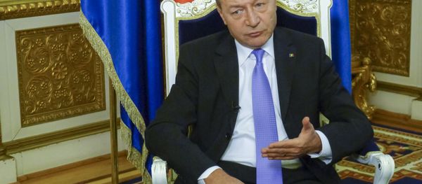 President Traian Basescu speaks during interview with The Associated Press on Monday, March 17, 2014 at the Cotroceni Palace which houses the president’s offices. President Traian Basescu speaks during interview with The Associated Press on Monday, March 17, 2014 at the Cotroceni Palace which houses the president’s offices. - Sputnik International