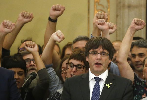 Catalan President Carles Puigdemont sings the Catalan anthem inside the parliament after a vote on independence in Barcelona, Spain, Friday, Oct. 27, 2017.  - Sputnik International