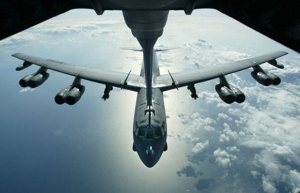 A US Air Force B-52 bomber returning from a mission over Iraq is refueling from a KC-10 plane over the Black Sea, in this Friday, March 28, 2003 photo A US Air Force B-52 bomber returning from a mission over Iraq is refueling from a KC-10 plane over the Black Sea, in this Friday, March 28, 2003 photo - Sputnik International