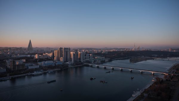 A general view shows the Pyongyang city skyline and Taedong river (File) - Sputnik International