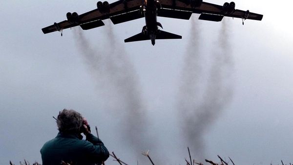 March 3, 2002 file photo shows a member of the public watching a US Air Force B 52 bomber arriving at RAF Fairford in western England. Pushing his vision of a nuclear weapons-free world, President Barack Obama returned to Prague on Thursday, April 8, 2010 to sign a pivotal treaty aimed at sharply paring U.S. and Russian arsenals — and repairing soured relations between the nations. With that, they will commit their nations to slash the number of strategic nuclear warheads by one-third and more than halve the number of missiles, submarines and bombers carrying them, pending ratification by their legislatures. The new treaty will shrink those warheads to 1,550 over seven years. That still allows for mutual destruction several times over. But it will send a strong signal that Russia and the U.S., which between them own more than 90 percent of the world's nuclear weapons, are serious about disarmament. - Sputnik International