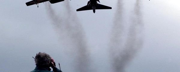 March 3, 2002 file photo shows a member of the public watching a US Air Force B 52 bomber arriving at RAF Fairford in western England. Pushing his vision of a nuclear weapons-free world, President Barack Obama returned to Prague on Thursday, April 8, 2010 to sign a pivotal treaty aimed at sharply paring U.S. and Russian arsenals — and repairing soured relations between the nations. With that, they will commit their nations to slash the number of strategic nuclear warheads by one-third and more than halve the number of missiles, submarines and bombers carrying them, pending ratification by their legislatures. The new treaty will shrink those warheads to 1,550 over seven years. That still allows for mutual destruction several times over. But it will send a strong signal that Russia and the U.S., which between them own more than 90 percent of the world's nuclear weapons, are serious about disarmament. - Sputnik International