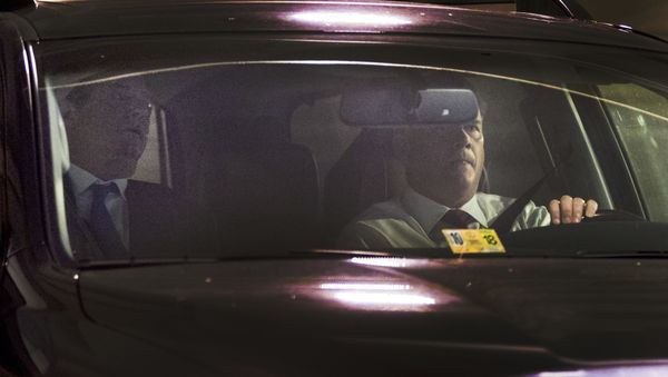 Former Trump Campaign Chairman Paul Manafort, left, leaves his home in Alexandria, Va., Monday, Oct. 30, 2017, in Washington - Sputnik International