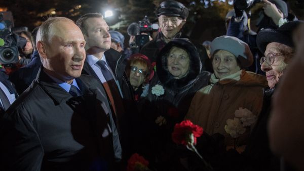 Putin at the opening of the Wall of Grief memorial in the Russian capital dedicated to victims of Soviet repression. October 30, 2017. Putin at the opening of the Wall of Grief memorial in the Russian capital dedicated to victims of Soviet repression. October 30, 2017. - Sputnik International