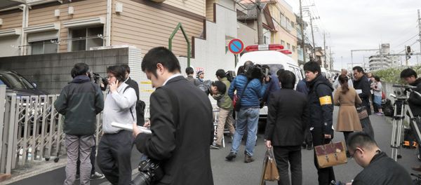 Members of the media gather in front of an apartment building where media reported nine bodies were found in Zama, Kanagawa Prefecture, Japan in this photo taken by Kyodo on October 31, 2017 Members of the media gather in front of an apartment building where media reported nine bodies were found in Zama, Kanagawa Prefecture, Japan in this photo taken by Kyodo on October 31, 2017 - Sputnik International