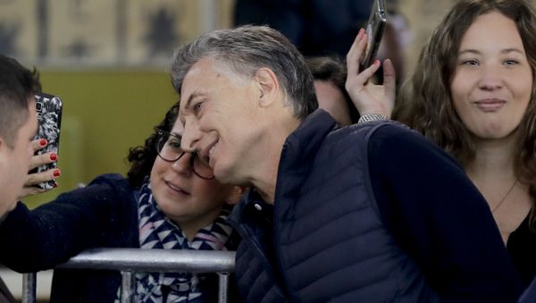 Argentina's President Mauricio Macri takes a selfie with supporters after casting his vote during midterm legislative elections in Buenos Aires, Argentina, Sunday, Oct. 22, 2017. - Sputnik International