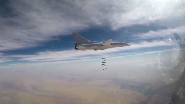 A Russian Air Force long-range bomber TU-22M3 seen here bombing Daesh targets in Syrian province of Deir ez-Zor - Sputnik International