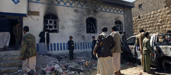 Yemenis look at a building damaged during a police raid on a hideout of al-Qaida militants in Arhab region, north of Sanaa, Yemen. (File) Yemenis look at a building damaged during a police raid on a hideout of al-Qaida militants in Arhab region, north of Sanaa, Yemen. (File) - Sputnik International