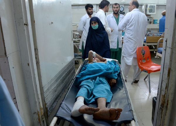 An injured Afghan youth receives treatment at a hospital following a suspected US drone airstrike in the Achin district of Nangarhar province. (File) - Sputnik International