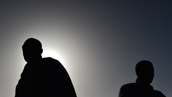 Men at the Libyan coast. (File) - Sputnik International
