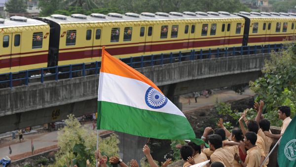 (File) Indian school students wave to greet a Kolkata Metro coach during its inaugural run in Kolkata on August 22, 2009 (File) Indian school students wave to greet a Kolkata Metro coach during its inaugural run in Kolkata on August 22, 2009 - Sputnik International