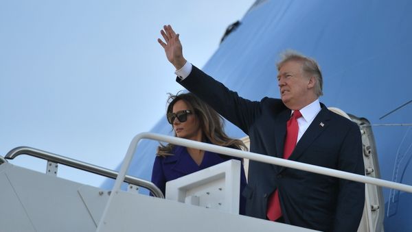 US President Donald Trump and First Lady Melania Trump board Air Force One departing from Andrews Air Force Base, Maryland on November 3, 2017, embarking on a 11-day tour of Asia US President Donald Trump and First Lady Melania Trump board Air Force One departing from Andrews Air Force Base, Maryland on November 3, 2017, embarking on a 11-day tour of Asia - Sputnik International