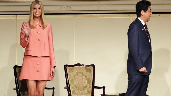 Ivanka Trump, left, adviser to and daughter of U.S. President Donald Trump, and Japan's Prime Minister Shinzo Abe attend a meeting of the World Assembly for Women (WAW!) in Tokyo Friday, Nov. 3, 2017. Ivanka Trump, left, adviser to and daughter of U.S. President Donald Trump, and Japan's Prime Minister Shinzo Abe attend a meeting of the World Assembly for Women (WAW!) in Tokyo Friday, Nov. 3, 2017. - Sputnik International