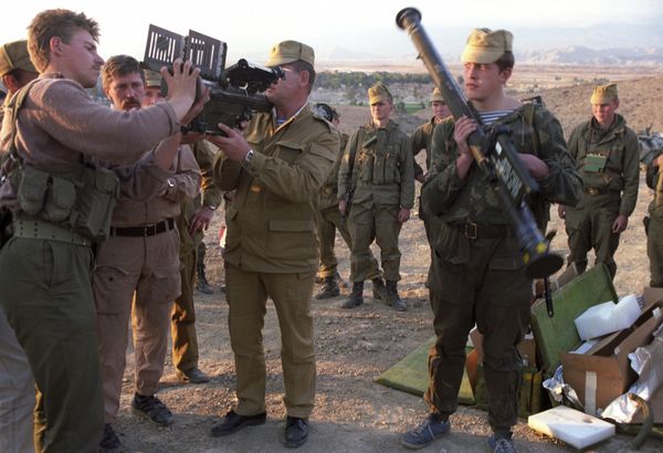 A Soviet special forces group is seen after the capture of an enemy caravan. The trophies include Stinger systems. File photo  - Sputnik International
