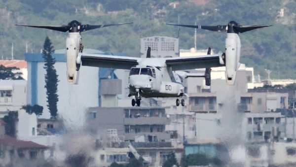 An MV-22 Osprey aircraft flies at the Marine Corps Air Station Futenma in Ginowan, Okinawa prefecture (File) - Sputnik International