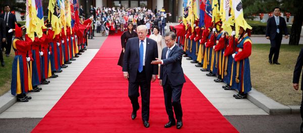 U.S. President Donald Trump walks with South Korea's President Moon Jae-in during a welcoming ceremony at the Presidential Blue House in Seoul, South Korea, November 7, 2017 U.S. President Donald Trump walks with South Korea's President Moon Jae-in during a welcoming ceremony at the Presidential Blue House in Seoul, South Korea, November 7, 2017 - Sputnik International