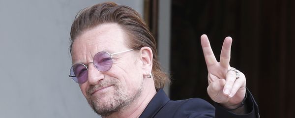 In this Monday, July 24, 2017 file photo, U2 singer Bono makes a peace sign as he arrives for a meeting at the Elysee Palace, in Paris, France. In this Monday, July 24, 2017 file photo, U2 singer Bono makes a peace sign as he arrives for a meeting at the Elysee Palace, in Paris, France. - Sputnik International