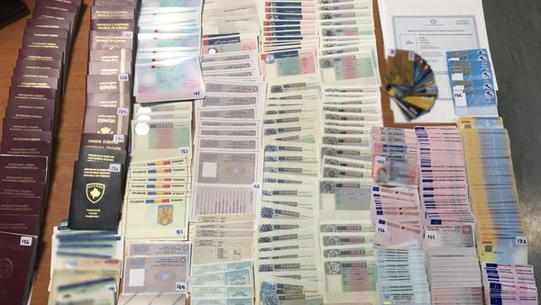 Some of the hundreds of fake passports and ID cards found in Athens - Sputnik International