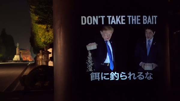 Robin Bell, founder of Bell Visuals, takes anti-Trump protest to Japan - Sputnik International