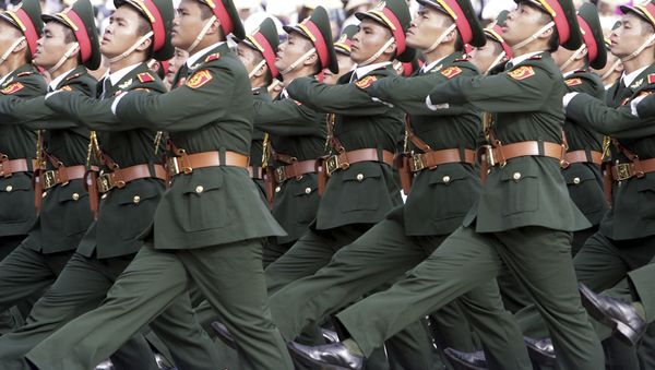 In this Sept. 2, 2015, file photo, Vietnamese soldiers march during a military parade in Hanoi, Vietnam. - Sputnik International