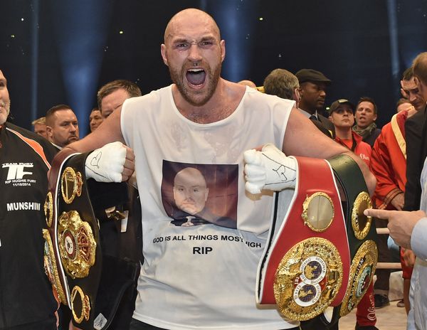 In this Nov. 29, 2015 file photo, Britain's new world champion Tyson Fury, celebrates with the WBA, IBF, WBO and IBO belts after winning the world heavyweight title fight against Ukraine's Wladimir Klitschko in Duesseldorf, western Germany.  - Sputnik International