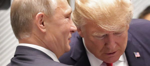 Russian President Vladimir Putin and US President Donald Trump, right, are seen here ahead of the first working meeting of the Asia-Pacific Economic Cooperation leaders Russian President Vladimir Putin and US President Donald Trump, right, are seen here ahead of the first working meeting of the Asia-Pacific Economic Cooperation leaders - Sputnik International