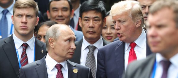 Russian President Vladimir Putin and US President Donald Trump are seen here ahead of the first working meeting of the Asia-Pacific Economic Cooperation leaders - Sputnik International