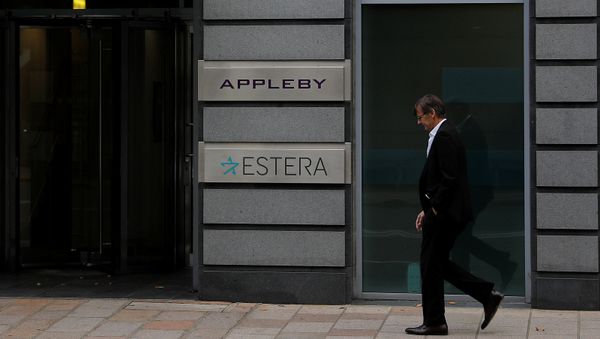 A man walks past the offices of Appleby in St Helier, Jersey, Britain November 7, 2017 - Sputnik International