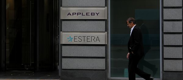 A man walks past the offices of Appleby in St Helier, Jersey, Britain November 7, 2017 - Sputnik International