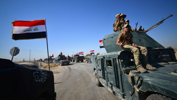 Members of Iraqi federal forces gather to continue to advance in military vehicles in Kirkuk, Iraq October 16, 2017 - Sputnik International