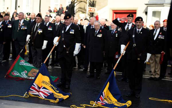 Flags from the Royal British Legion are held to the ground during the Remembrance Sunday Cenotaph wreath laying ceremony and commemoration of the 30th anniversary of the IRA Enniskillen bombing in Enniskillen, Northern Ireland, November 12, 2017 - Sputnik International