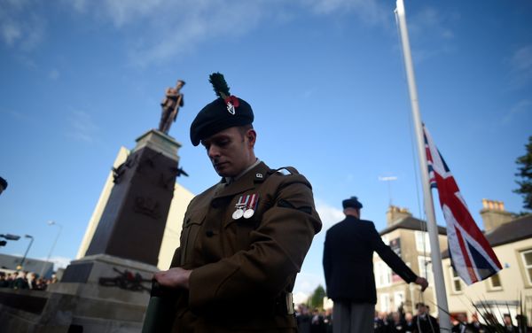 The Union flag is lowered to half mast during the Remembrance Sunday Cenotaph wreathe laying ceremony and commemoration of the 30th anniversary of the IRA Enniskillen bombing in Enniskillen, Northern Ireland, November 12, 2017 - Sputnik International