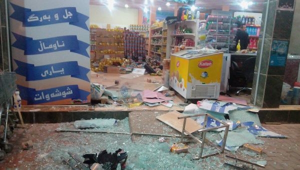 A damaged storefront is seen after an earthquake in Halabja, Iraq, November 12, 2017 - Sputnik International