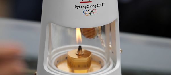 Athletics Olympic - Flame Handover Ceremony For Pyeongchang 2018 Olympics - Panathenaic Stadium, Athens, Greece - October 31, 2017 General view of the flame during the handover ceremony Athletics Olympic - Flame Handover Ceremony For Pyeongchang 2018 Olympics - Panathenaic Stadium, Athens, Greece - October 31, 2017 General view of the flame during the handover ceremony - Sputnik International