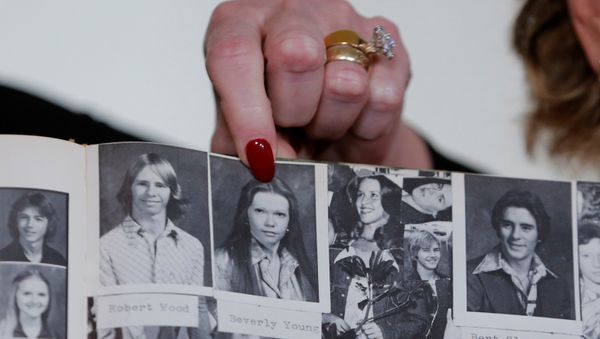 Accuser Beverly Young Nelson points to a photograph of herself in her high school yearbook after making a statement claiming that Alabama senate candidate Roy Moore sexually harassed her when she was 16, in New York, U.S., November 13, 2017 Accuser Beverly Young Nelson points to a photograph of herself in her high school yearbook after making a statement claiming that Alabama senate candidate Roy Moore sexually harassed her when she was 16, in New York, U.S., November 13, 2017 - Sputnik International