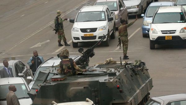 Military vehicles and soldiers patrol the streets in Harare, Zimbabwe, November 15,2017 Military vehicles and soldiers patrol the streets in Harare, Zimbabwe, November 15,2017 - Sputnik International