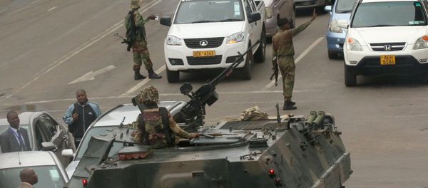 Military vehicles and soldiers patrol the streets in Harare, Zimbabwe, November 15,2017 Military vehicles and soldiers patrol the streets in Harare, Zimbabwe, November 15,2017 - Sputnik International